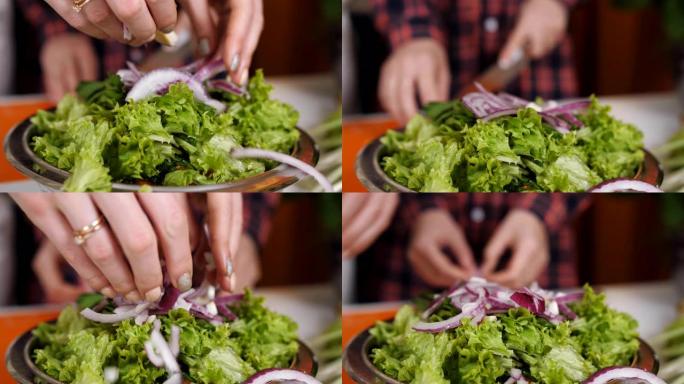在沙拉的盘子里落下紫色洋葱，慢动作。