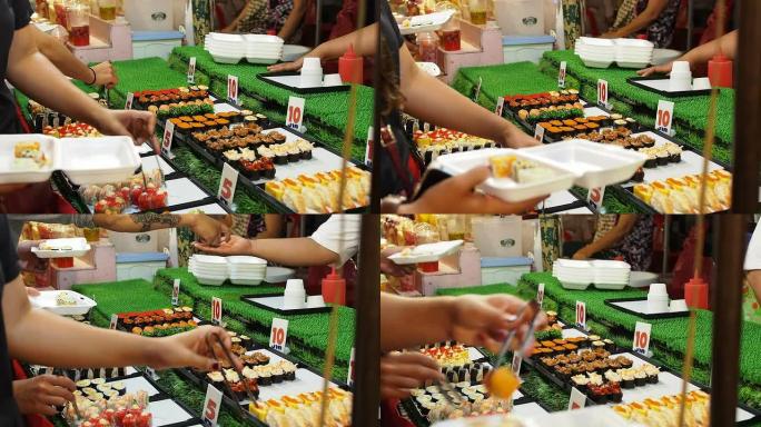 泰国传统亚洲街头食品市场的寿司摊
