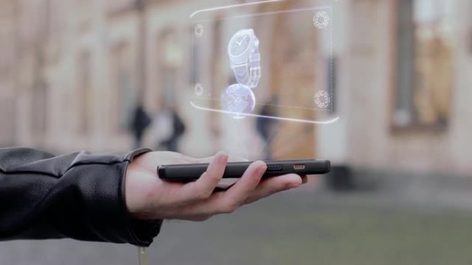 男性手展智能手机概念性平视显示器全息腕表