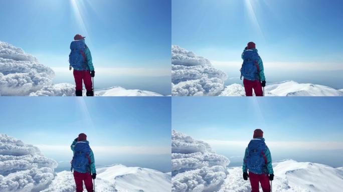 女登山者在山顶上移开目光