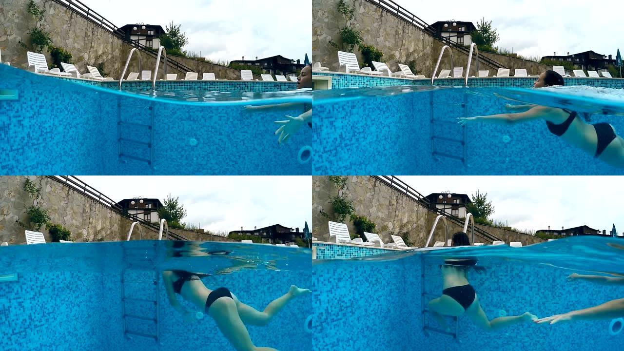 年轻的女性在酒店游泳池游泳，爬上梯子楼梯，gopro dome水下慢动作拍摄