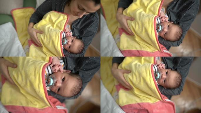 新生婴儿和妈妈之间的深情爱