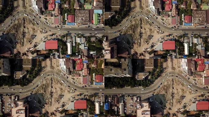 运输路口、交通交叉路、建筑路的4k夏季航拍画面，从上方看环线。