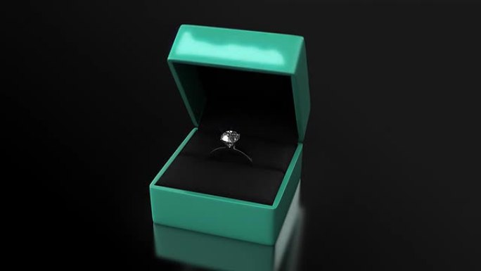 带绿色盒子的钻石戒指