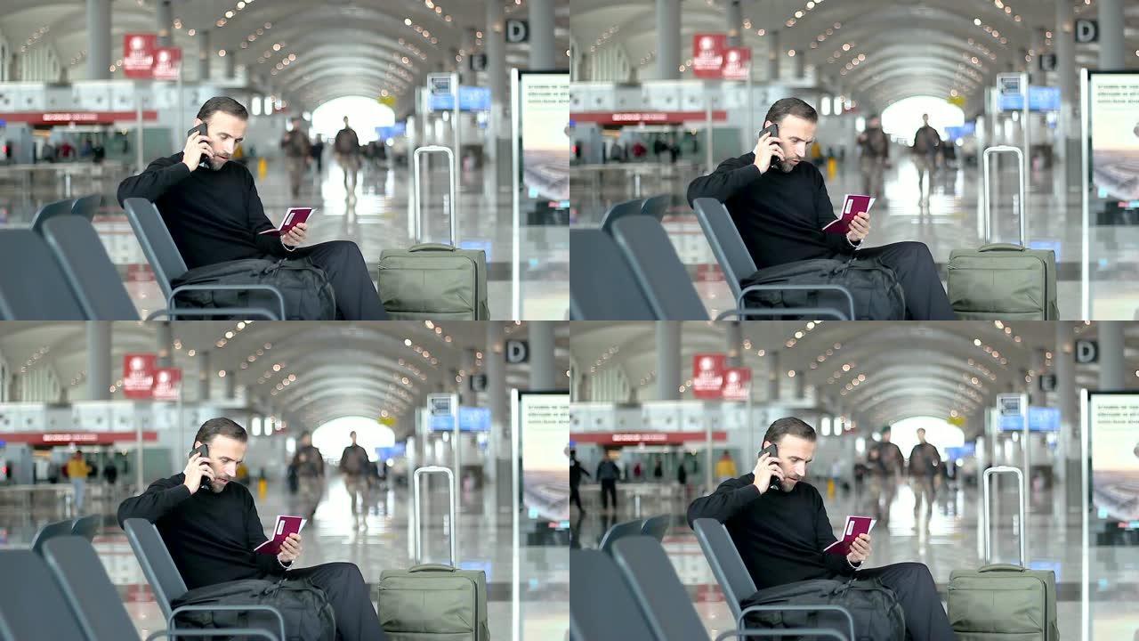 乘客在电话里看着他在候机室的护照