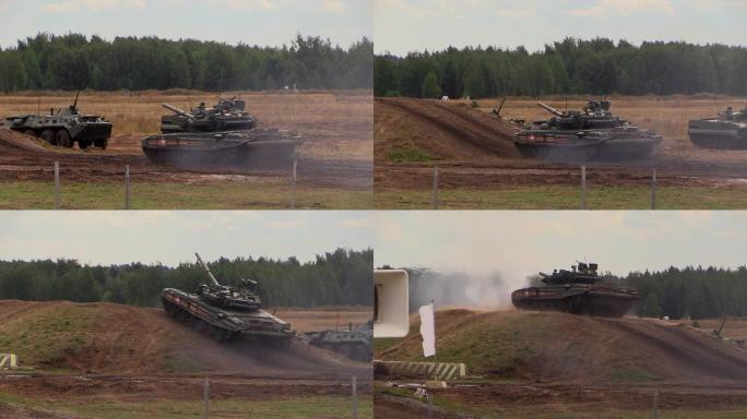 茹。俄罗斯，2014年8月17日:俄罗斯军队。T-90A坦克在移动中向山上射击。