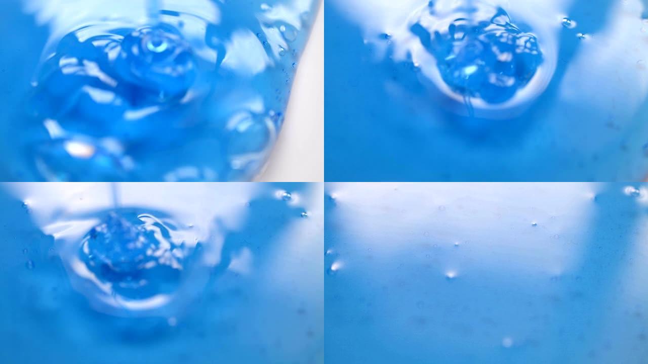白色背景上的蓝色凝胶液体