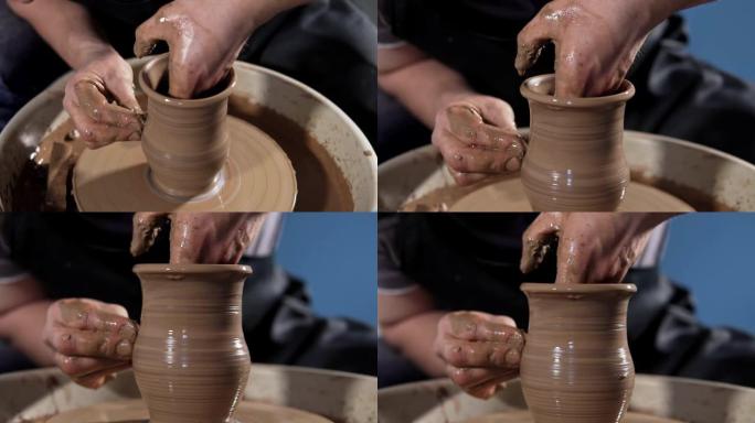 波特的作品特写。人手制作黏土壶。手工制作。工艺。