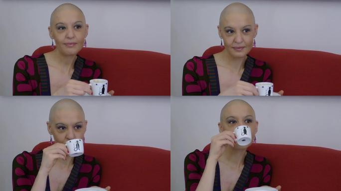 患有癌症的年轻女子放松身心，在家沙发上喝咖啡