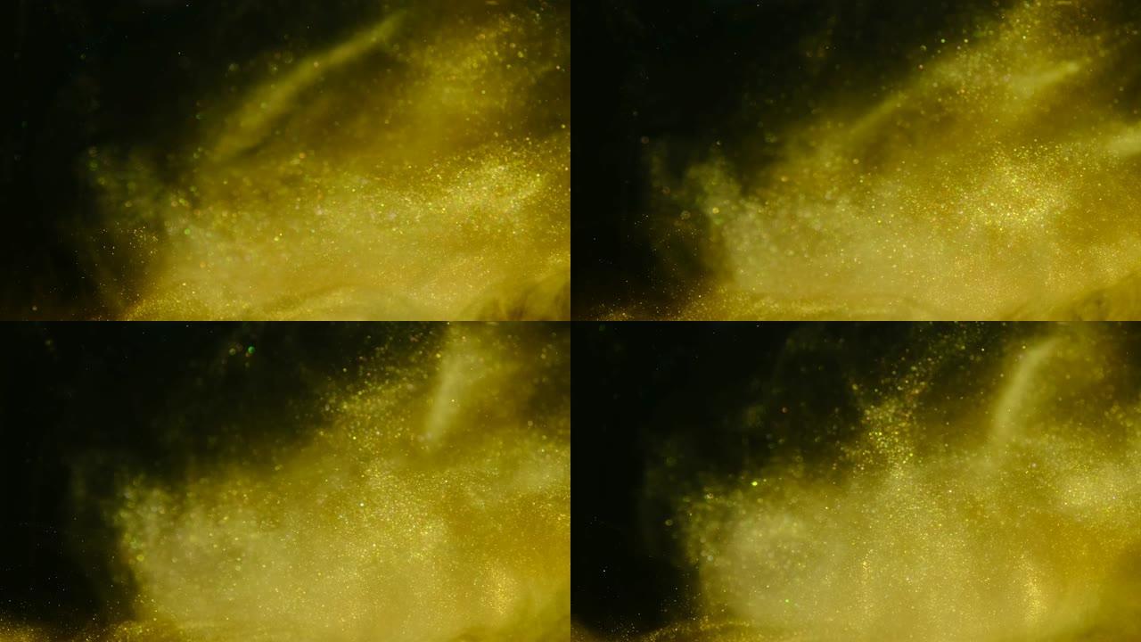 金色的沙子或灰尘创造了抽象的云层。艺术背景。