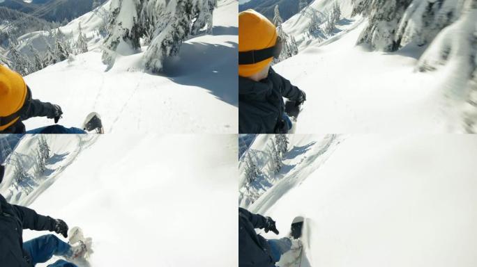 晴天在新鲜粉末雪中雕刻滑雪板极端视点