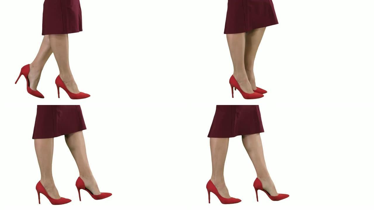 穿着红色高跟鞋的性感女人腿行走白色背景的商务女士