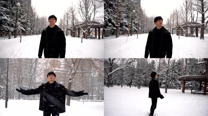 3个片段 -- 冬天下雪时快乐微笑自信的亚洲年轻人在公园