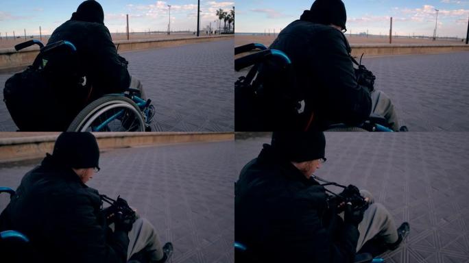 坐在轮椅上的摄影师用相机拍摄-工作-库存视频