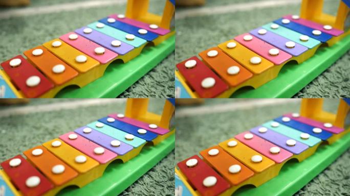 彩虹色木琴玩具。儿童和幼儿教育玩具