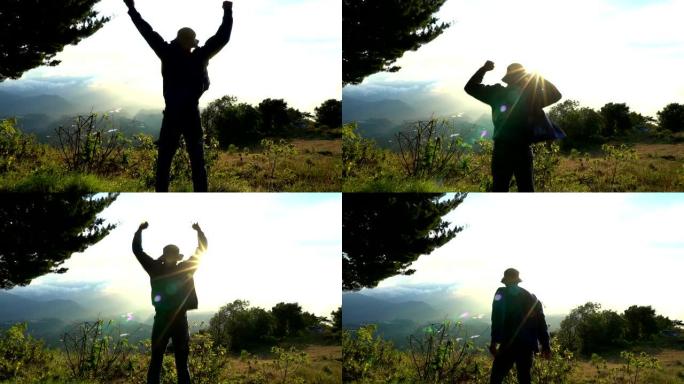 到达顶端。男人快乐地跳着，在日出时在美丽的山地兰西角举手。感觉很好。克服挑战。概念旅游全球地方。