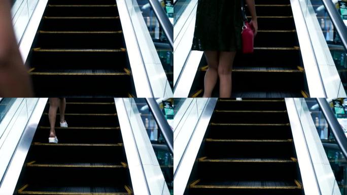 女人在自动扶梯上楼时的背景图。