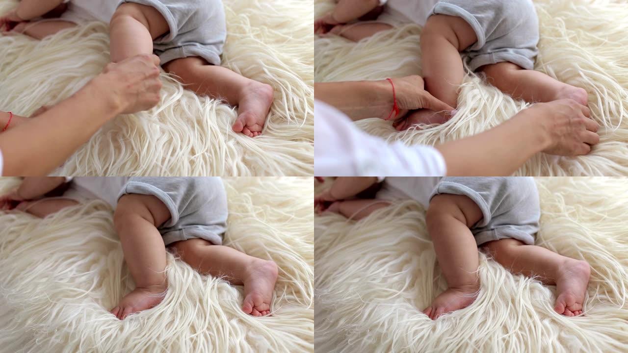 一个刚出生的男孩睡在卧室里蓬松的毯子上的特写镜头。