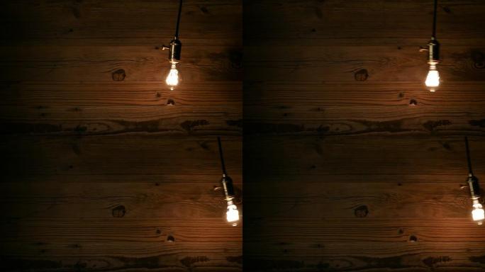 木制背景下的灯泡