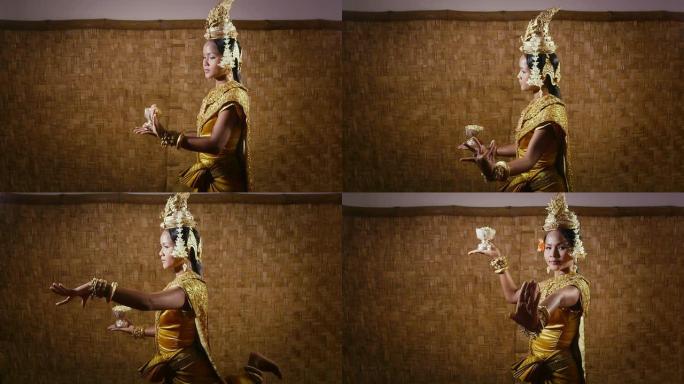 亚洲女舞者展示柬埔寨传统舞蹈，高棉艺术