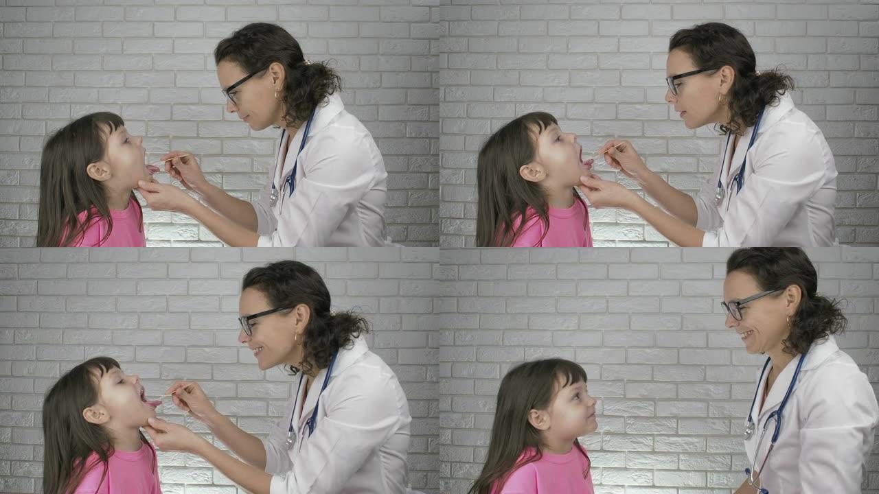 医生检查孩子的喉咙。