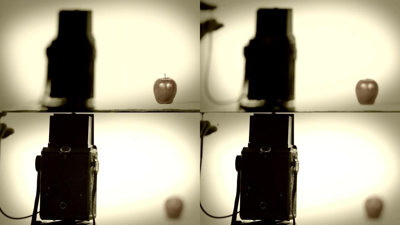 用老式50s相机长曝光拍摄苹果静果的过程。