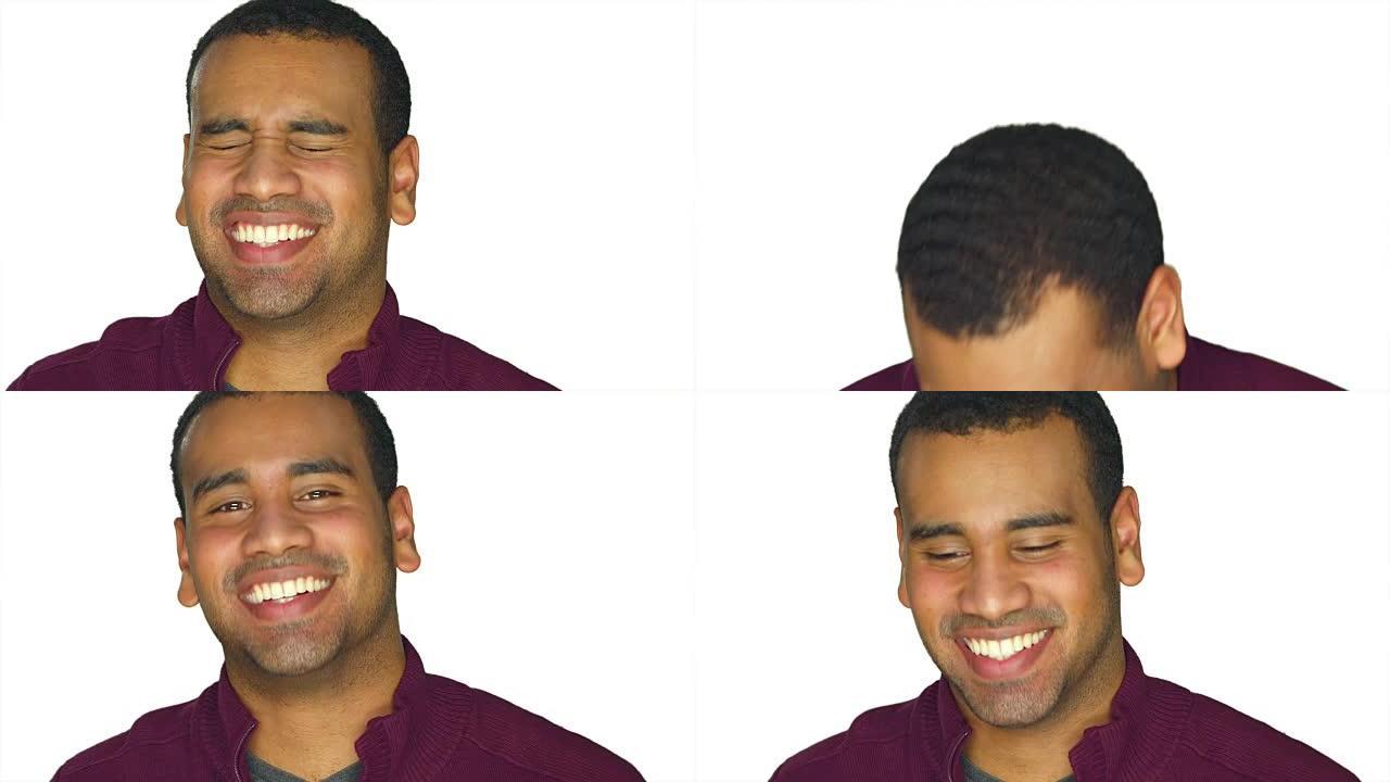 年轻的非洲裔美国人在白色工作室背景下微笑和大笑