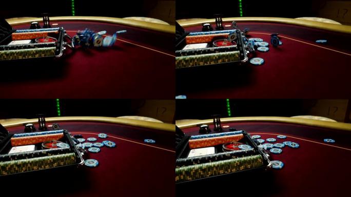 手提箱里装着扑克筹码的扑克桌，在赌场里掉在桌子上。用于赌博的扑克筹码。