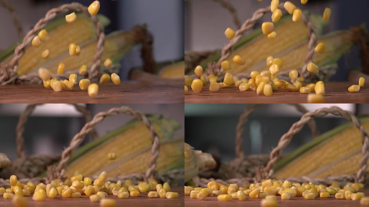 玉米玉米落在木头上。慢动作240 fps。在索尼rx 10上拍摄