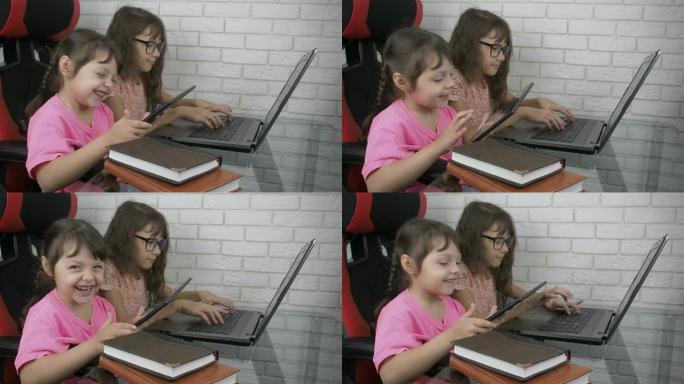 盯着屏幕。女孩们盯着他们的小玩意屏幕。