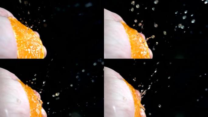 慢动作从橙子中榨汁特写