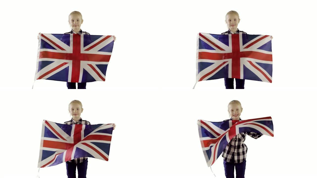 少女举着一面英国国旗在白色的背景。