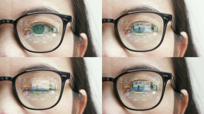 女人用全息摄影中的增强现实眼镜观看未来派的外观。概念: 未来眼睛的沉浸式技术