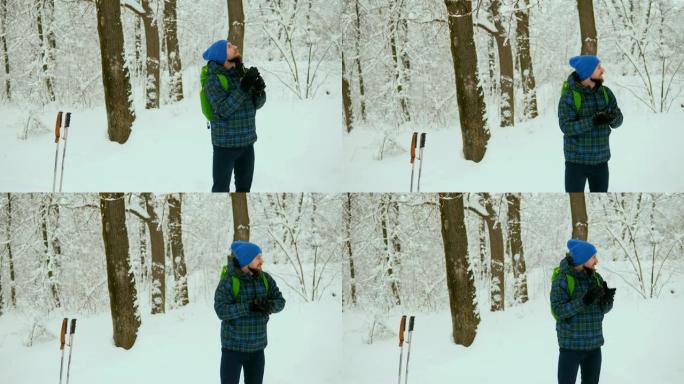 人类旅行者独自走过雪山。