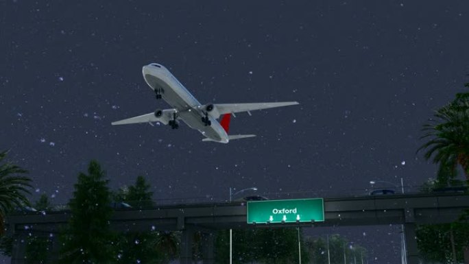 飞机在下雪的夜晚从美国牛津机场起飞