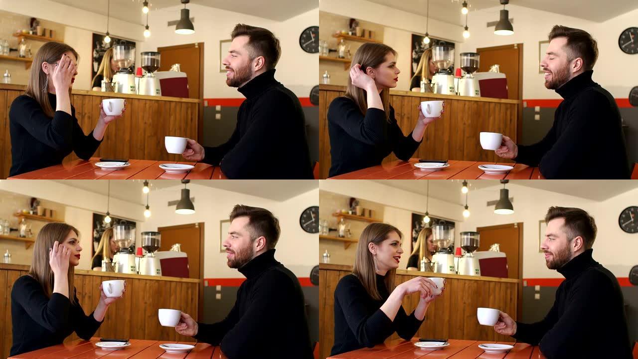 夫妇在咖啡店第一次约会时喝咖啡。慢动作。