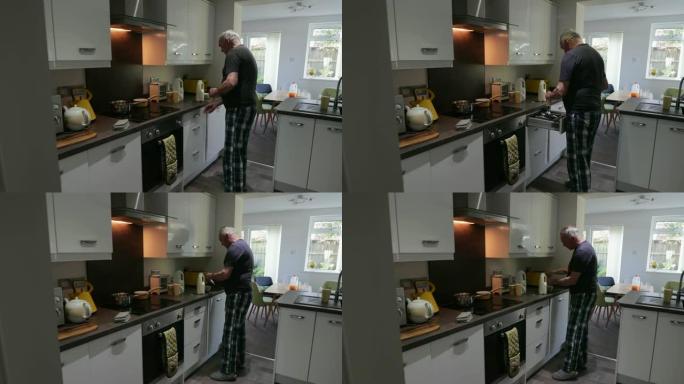 男人在家煮粥