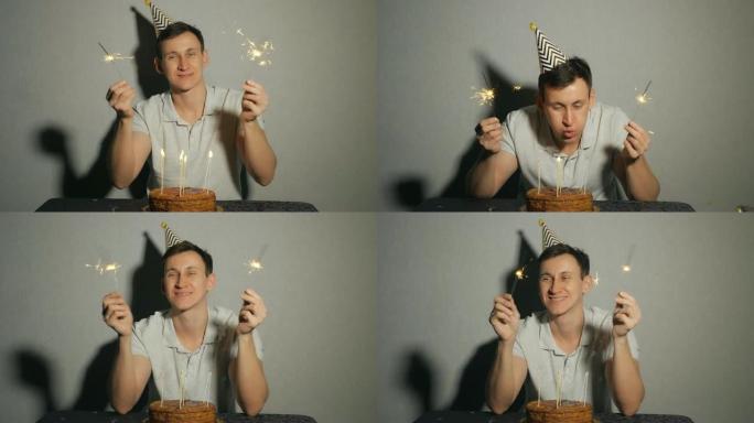拿着蛋糕和蜡烛的年轻人的特写镜头