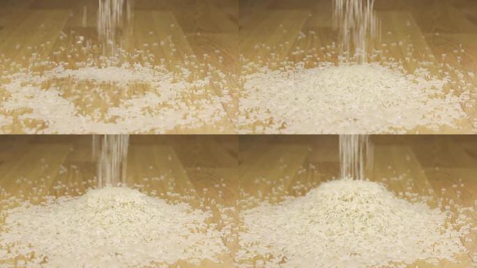 米粒落在木底一堆米上