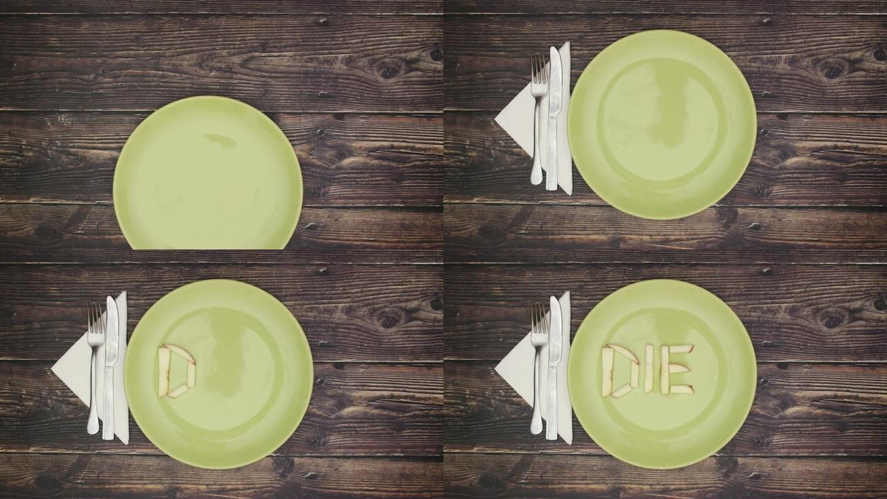 一个人的设置表和饮食词在dish-Stop motion上