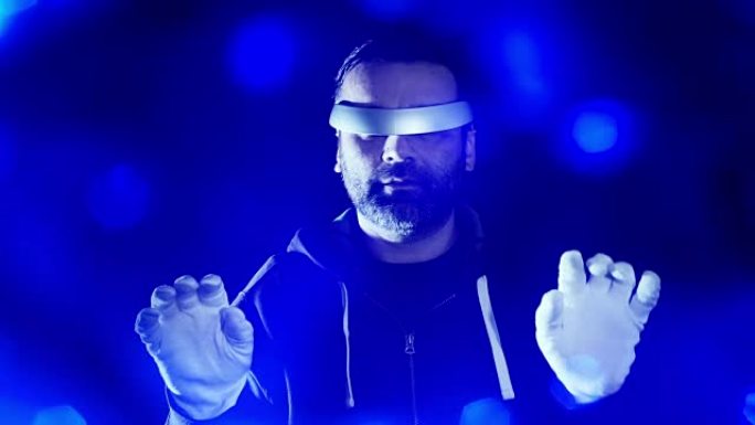 虚拟现实眼镜概念，戴着白手套的未来派黑客