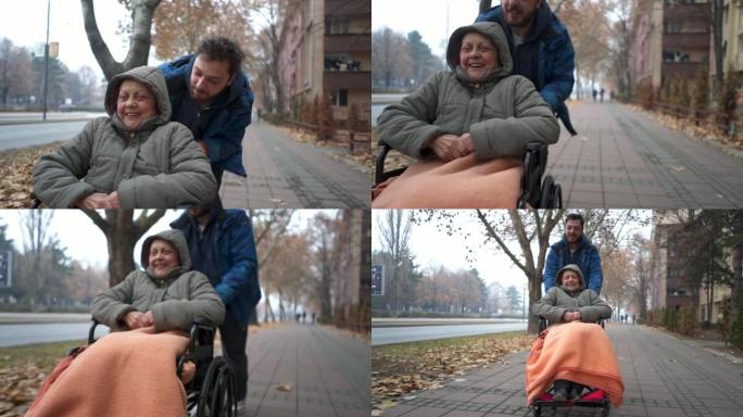 孙子和他的祖母坐在轮椅上享受他们在一起的时光