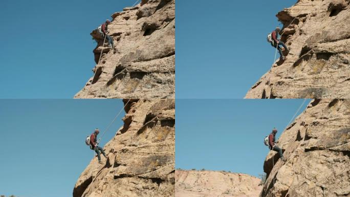 犹他州摩押的女登山者速降