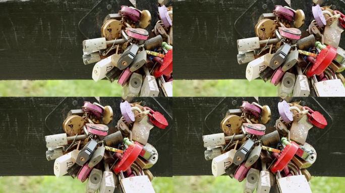 桥上有很多挂锁。秋天的白天。光滑的多莉射击。