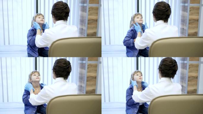 儿童医生穿着白色外套和医用手套触诊坐在沙发上可爱的小女孩的扁桃体