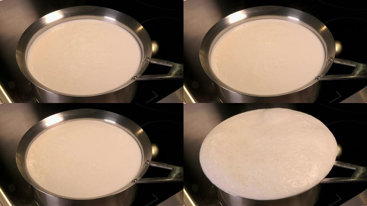 煮天然有机牛奶，将牛奶放在锅中煮沸，即将溢出的牛奶，溢出的牛奶