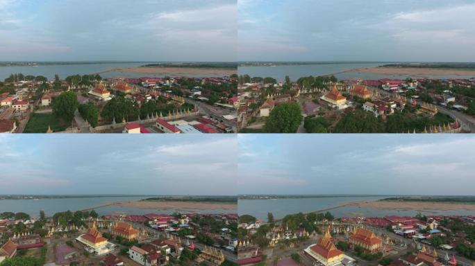 无人机射击: 飞越湄公河河畔宝塔和建筑物