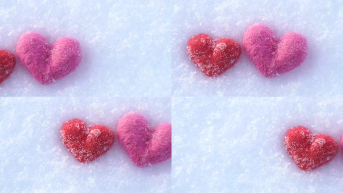 冬天白雪上的红色和粉红色羊毛心
