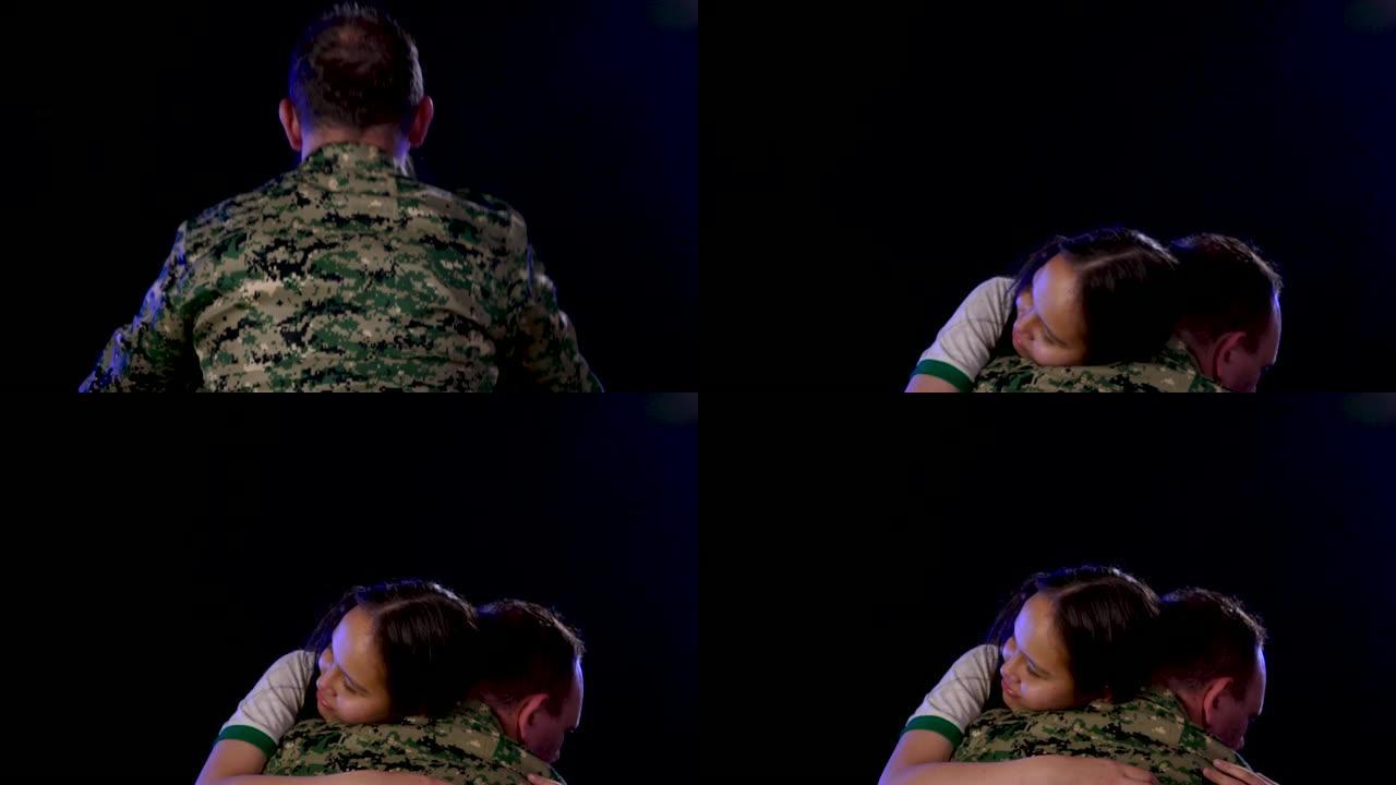 士兵在离开或从战场返回时拥抱女儿