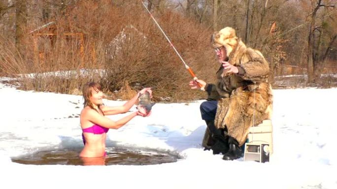 冬天的渔夫和女人。